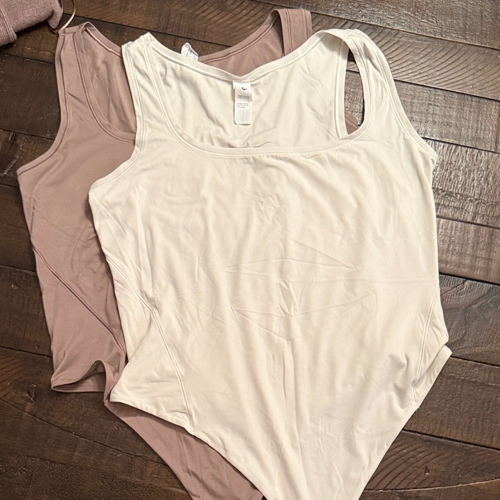 Women's Cream and Tan Lululemon Sleeveless Snap Bottom Bodysuits (2).